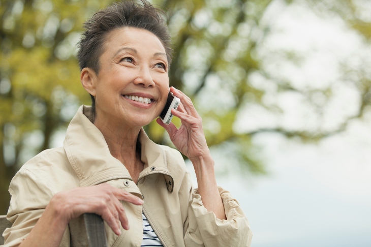lhgbenefits.com-medicare-insurance-solutions-pennsylvania-pa-klaus-herchenroder-woman-on-cellphone